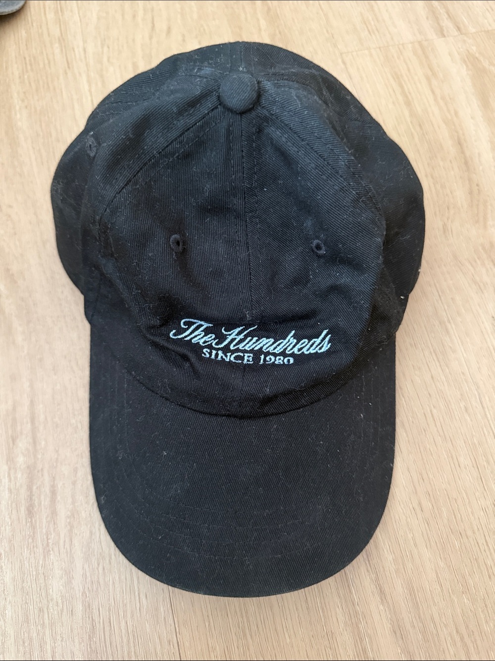 The Hundreds Black Cap with Light Blue Script Logo